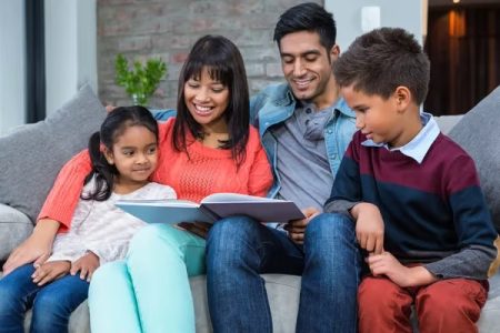 depositphotos_90554238-stock-photo-happy-young-family-reading-a-mxBXLjEWa7tPv4GP